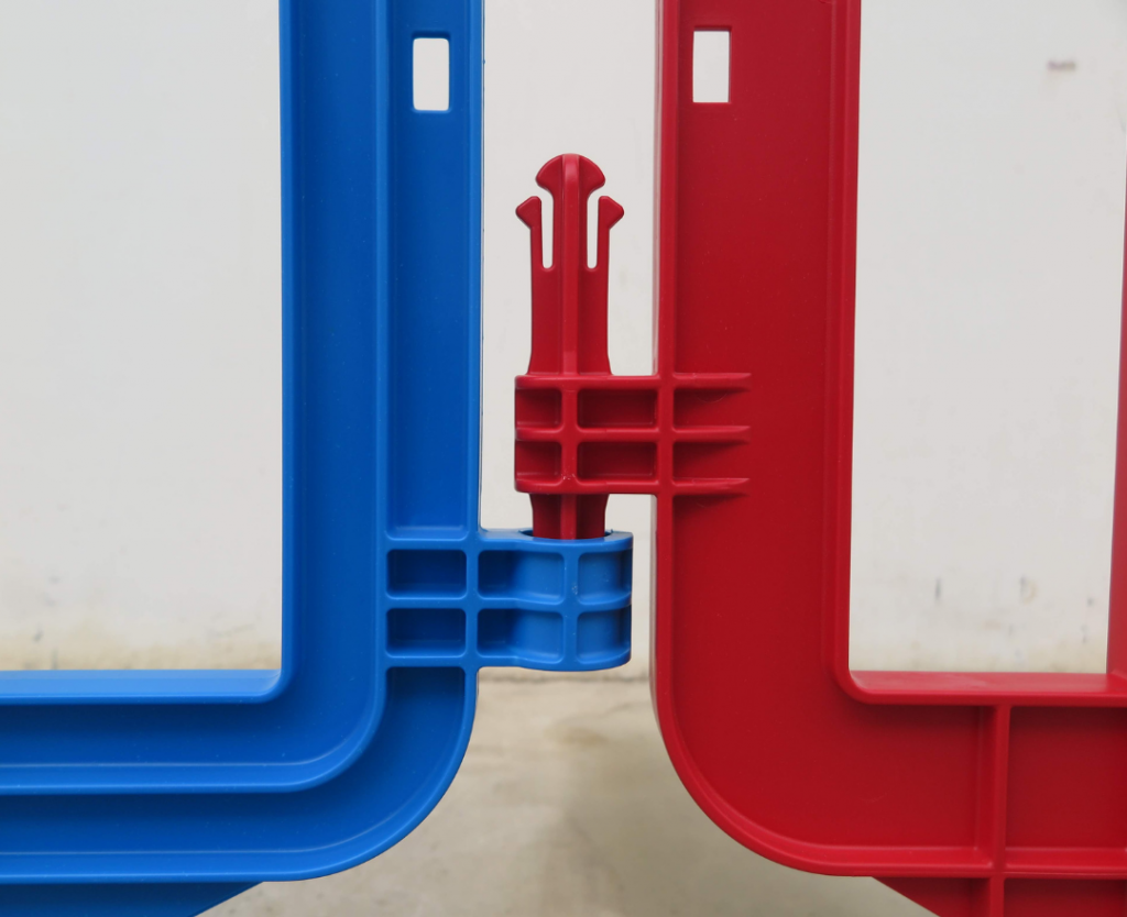 sistema de enganche de una valla peatonal de plástico movit